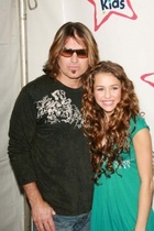 Miley Cyrus : TI4U_u1221159698.jpg