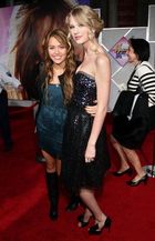 Miley Cyrus : TI4U_u1246472860.jpg