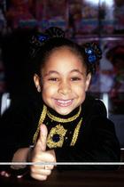 Raven-Symoné : raven-symon-1350758385.jpg