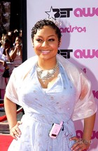 Raven-Symoné : raven-symon-1365088758.jpg